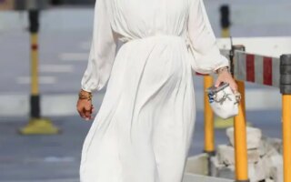 Vogue Williams Displays her Baby Bump in Chic White Dress