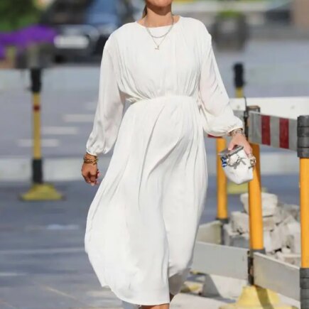 Vogue Williams Displays her Baby Bump in Chic White Dress