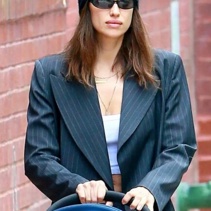 Irina Shayk Out for a Stroll in a White Crop Top and Chic Charcoal Suit
