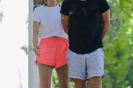 Margot Robbie in Pink Running Shorts Steps Out With Her Husband