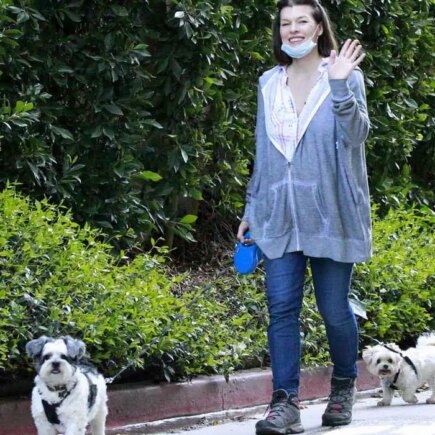 Milla Jovovich Cuts a Relaxed Look as She Takes Her Dogs For a Walk