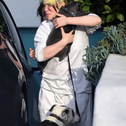 Billie Eilish in All White as She Receives New Puppy