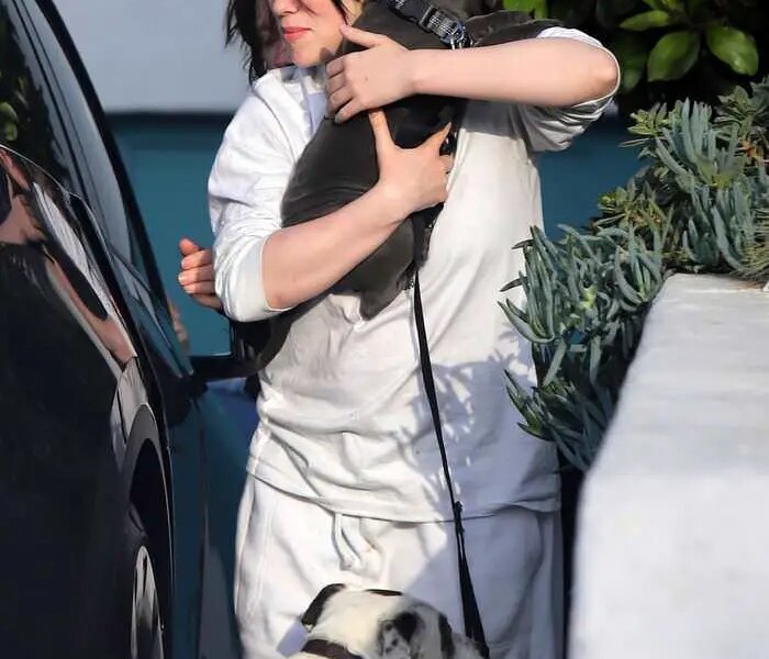 Billie Eilish in All White as She Receives New Puppy