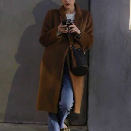 Emma Roberts Casual While Waiting for Her Car in LA