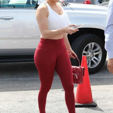 Jennifer Lopez in Dark Red Leggings Arrives at the Gym in Miami