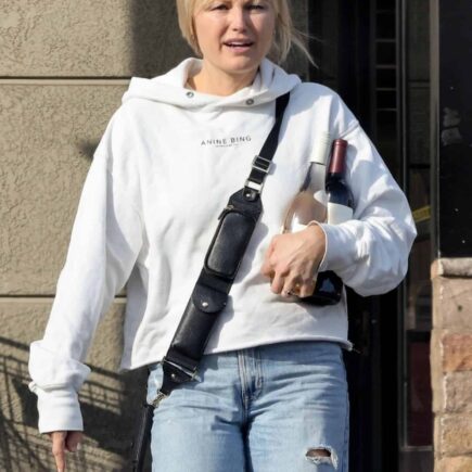 Malin Akerman Masters Casual Chic in Oversized Hoodie and Ripped Jeans