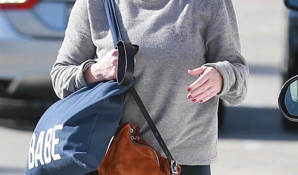 Jennifer Love Hewitt Glows Post-Gym in Relaxed Sweater and Sparkly Sneakers