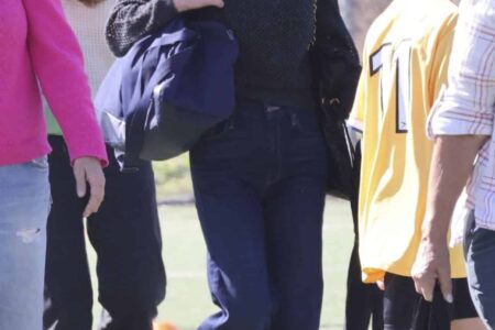 Christina Ricci Captures Retro Vibes with High-Waisted Jeans at Soccer Game