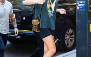 Taylor Swift Pairs Graphic T-Shirt and Shorts for a Casual-Cool Look