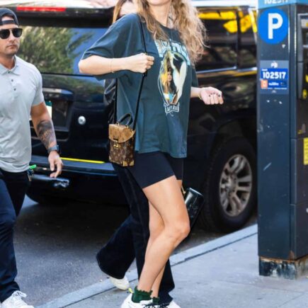 Taylor Swift Pairs Graphic T-Shirt and Shorts for a Casual-Cool Look