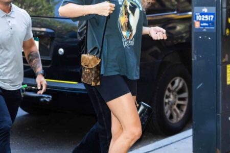 Taylor Swift Pairs Graphic T-Shirt and Shorts for a Casual-Cool Look