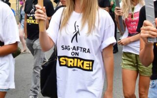 Margot Robbie Shows Solidarity with Writers Guild in “Double Strike”