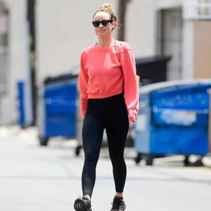 Olivia Wilde Leaves the Gym in Hot Pink Crew-Neck Sweater and Black Leggins