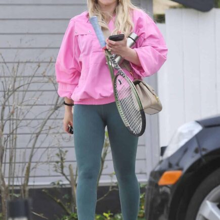 Hilary Duff in Sports Jumpsuit and Pink Windbreaker for Tennis Game