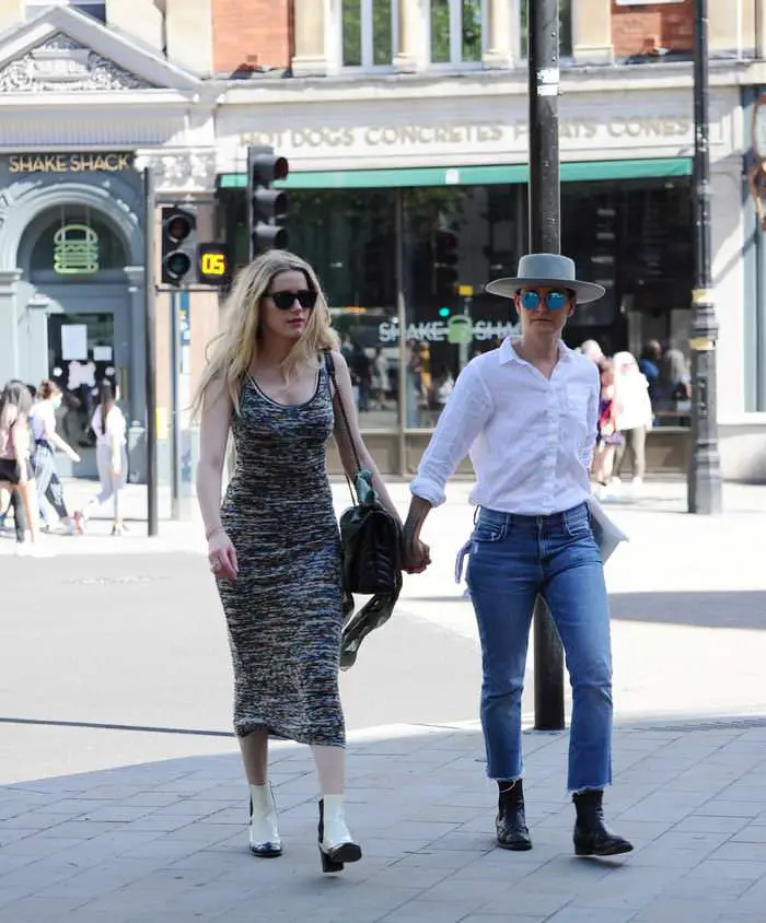 amber heard walks with her gf after 13 million libel trial with johnny depp 4