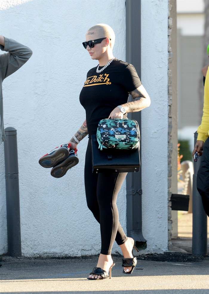 amber rose out and showing her new face tattoo in la 1