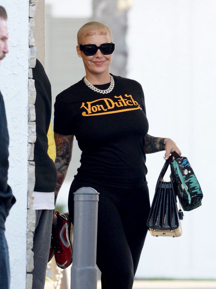 amber rose out and showing her new face tattoo in la 4