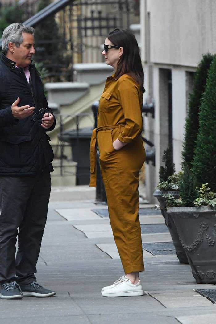 anne hathaway in mustard color jumpsuit out in nyc 1