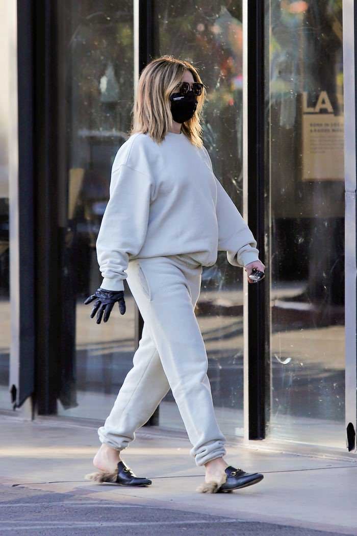 ashley tisdale opts for beige sweatsuit and black face mask on a coffee run in la 3