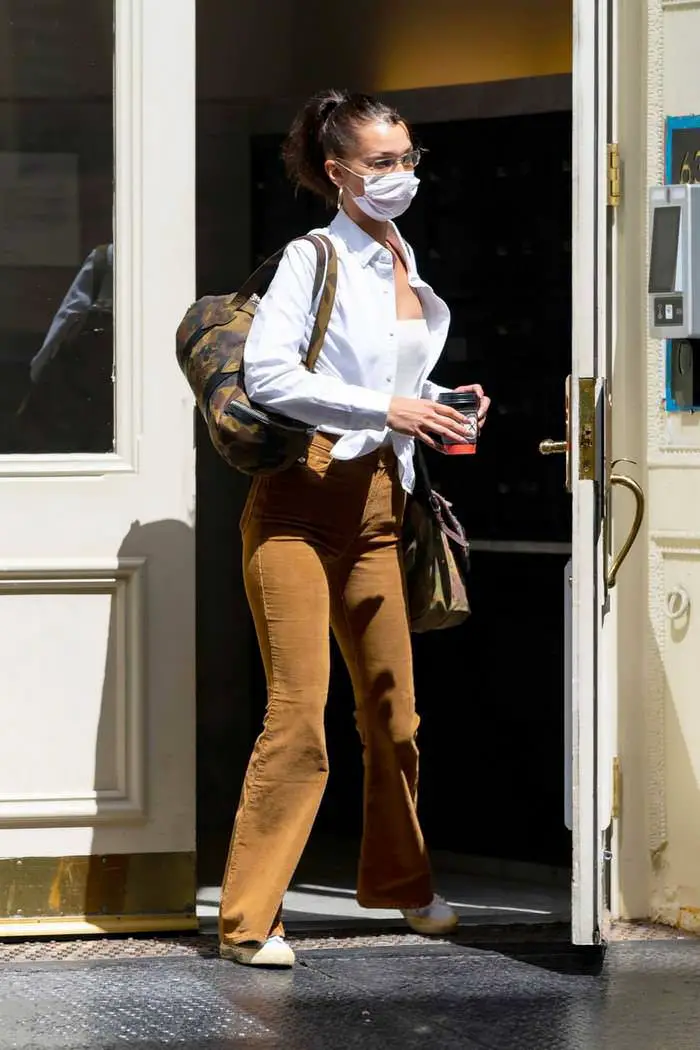 bella hadid cuts a typically chic figure with face mask 2