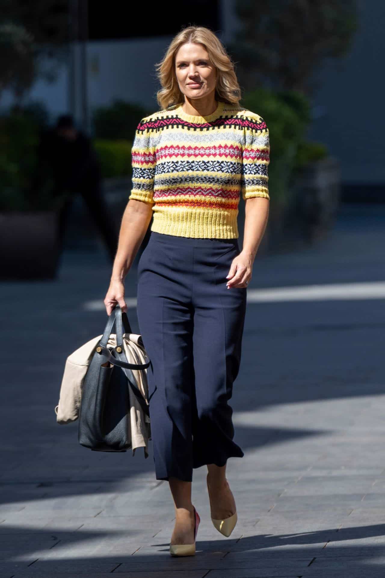 charlotte hawkins in colorful sweater enjoys a casual stroll 1