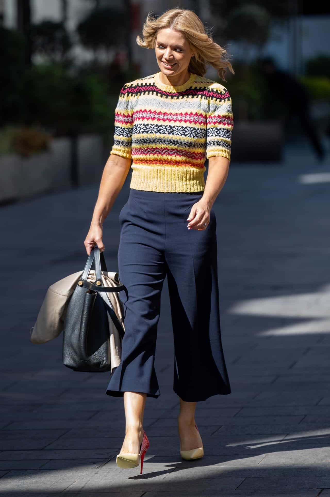 charlotte hawkins in colorful sweater enjoys a casual stroll 4