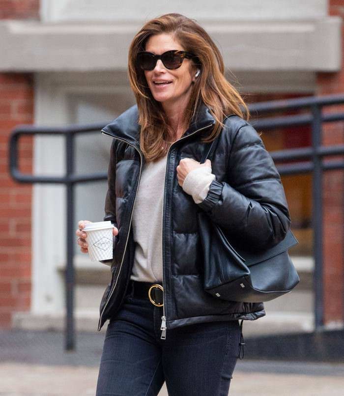 cindy crawford is all smiling as she takes a cup of coffee in nyc 1