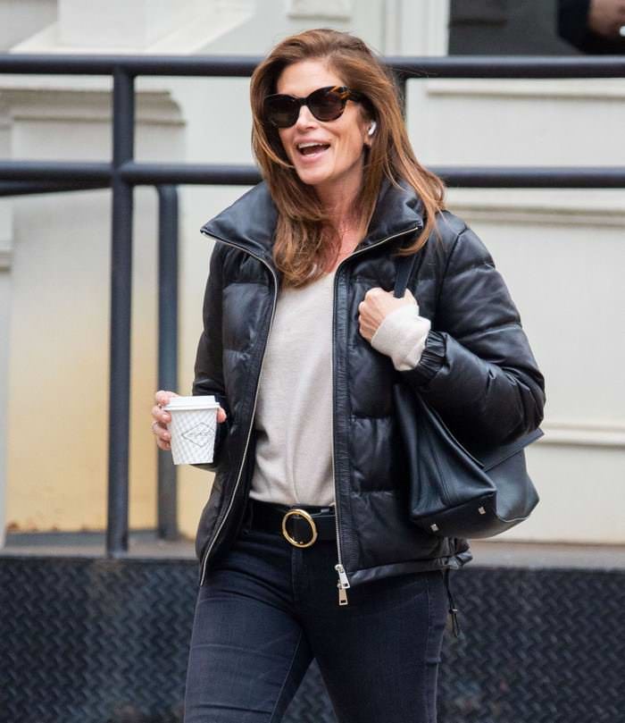 cindy crawford is all smiling as she takes a cup of coffee in nyc 2