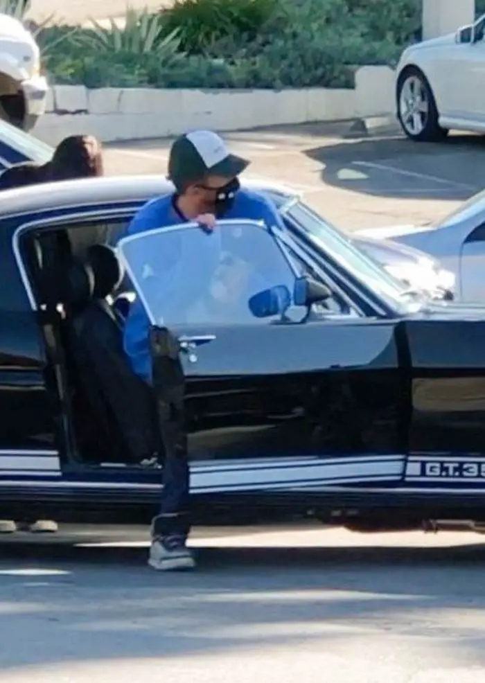 dakota johnson goes for a ride in her mustang gt350 with chris martin 1