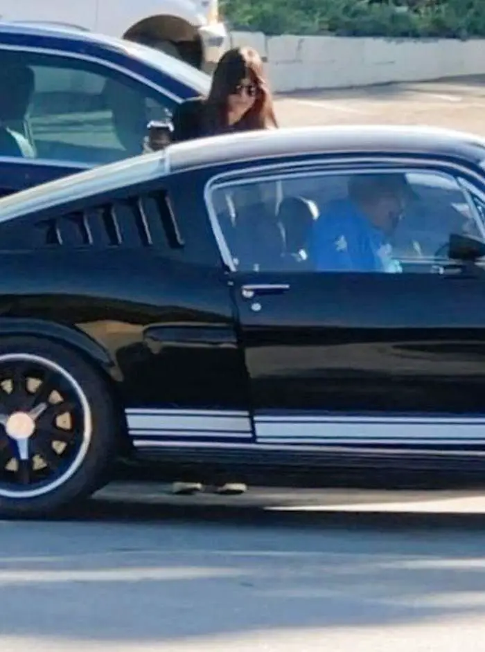 dakota johnson goes for a ride in her mustang gt350 with chris martin 3