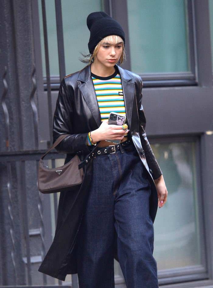 dua lipa casual in baggy blue jeans and black beanie hat in nyc 1