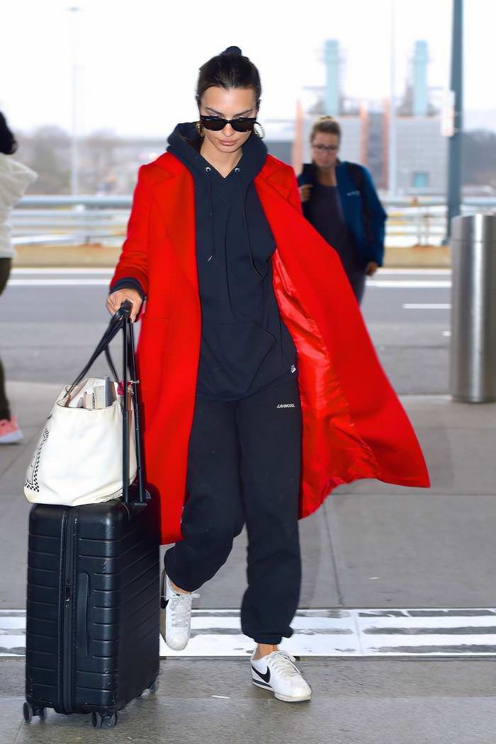 emily ratajkowski in red overcoat with casual sweats at jfk airport 4