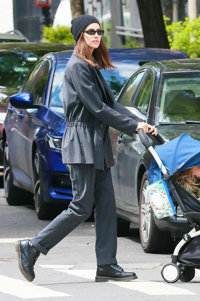 irina shayk out for a stroll in a white crop top and chic charcoal suit 2