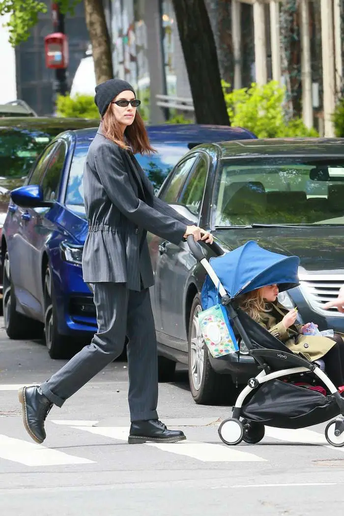 irina shayk out for a stroll in a white crop top and chic charcoal suit 3