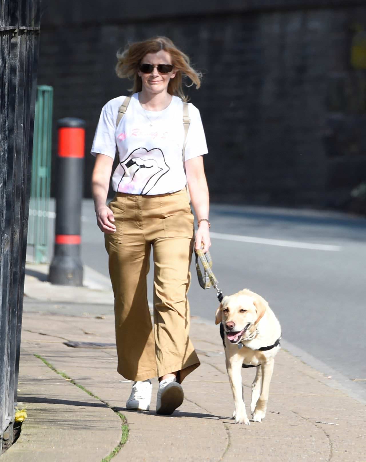 jane danson takes her dog out for a morning stroll 1
