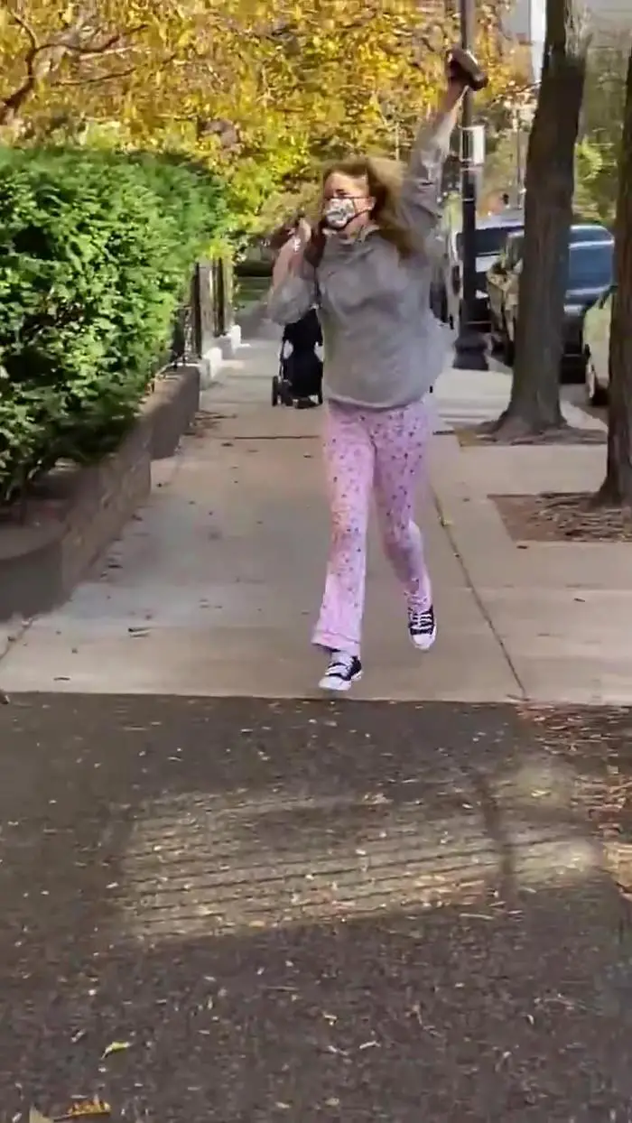 jennifer lawrence runs in pajama outside her apartment to celebrate joe biden s win 3