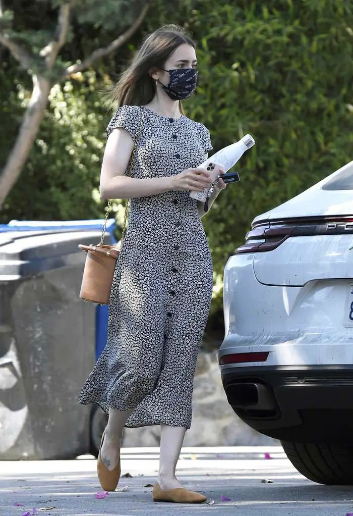 lily collins stepped out in a floral print dress without fiance charlie mcdowell 2