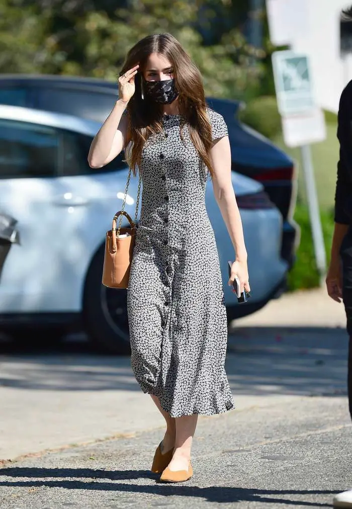 lily collins stepped out in a floral print dress without fiance charlie mcdowell 4