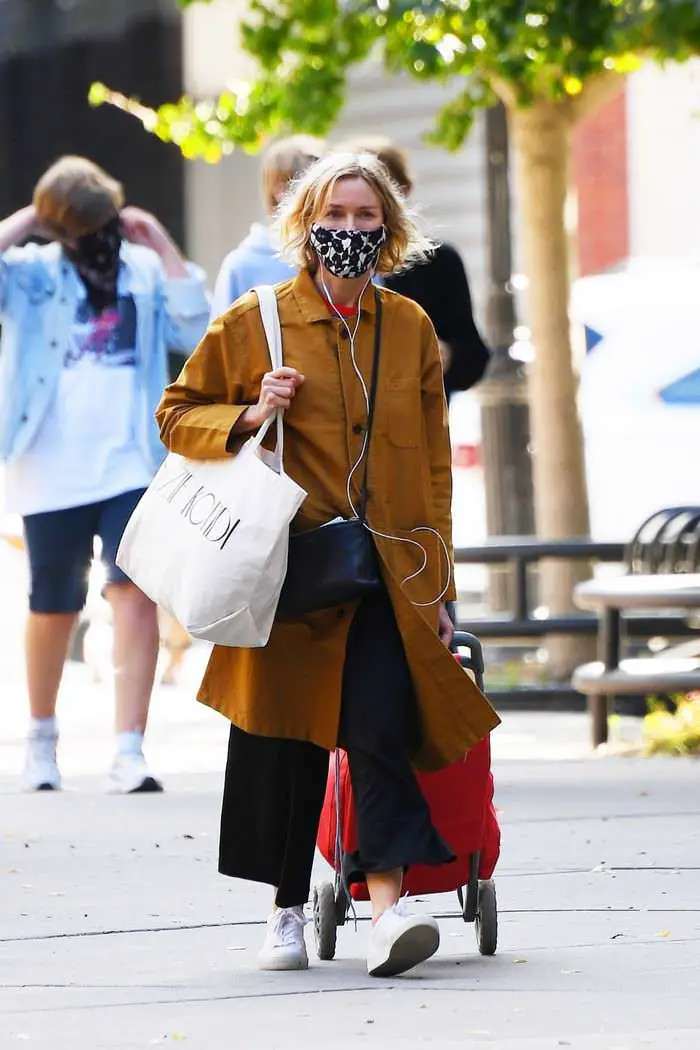 naomi watts looks stylish in a yellow coat while shopping in tribeca 2