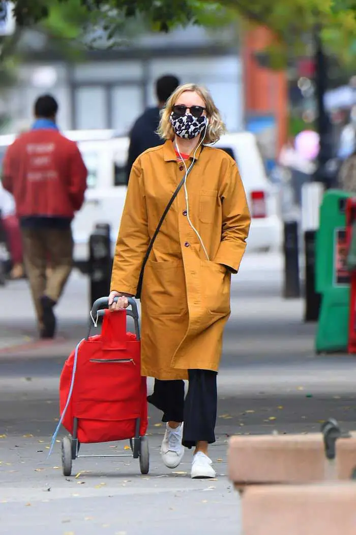naomi watts looks stylish in a yellow coat while shopping in tribeca 3