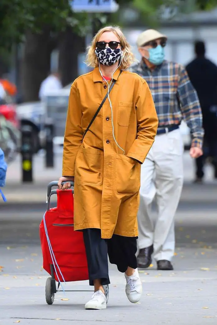 naomi watts looks stylish in a yellow coat while shopping in tribeca 4