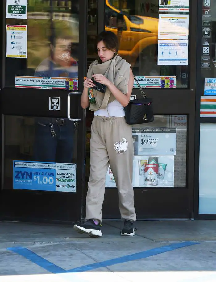 rainey qualley outside 7 eleven in los angeles 2