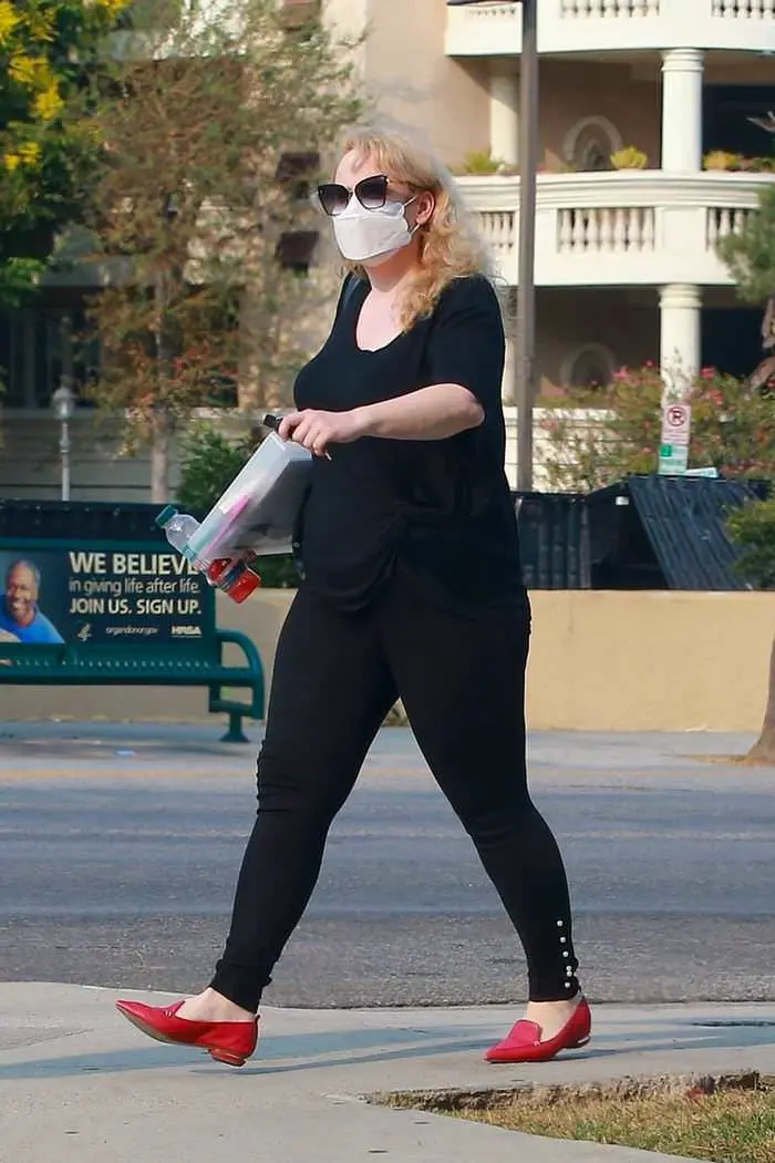 rebel wilson in an all black outfit while running errands in los angeles 1