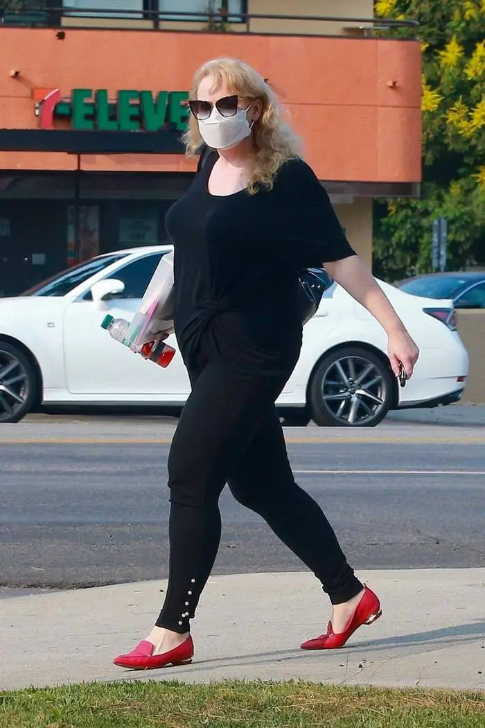 rebel wilson in an all black outfit while running errands in los angeles 2