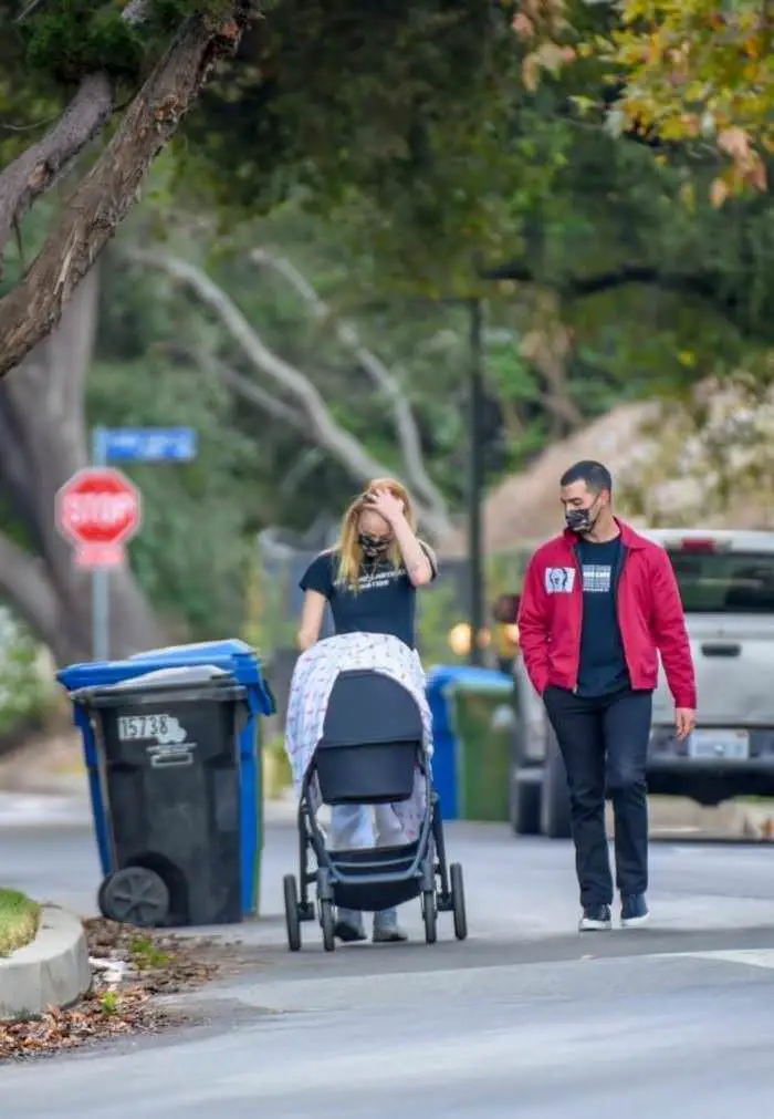 sophie turner and joe jonas walk with their baby girl around their neighborhood 1