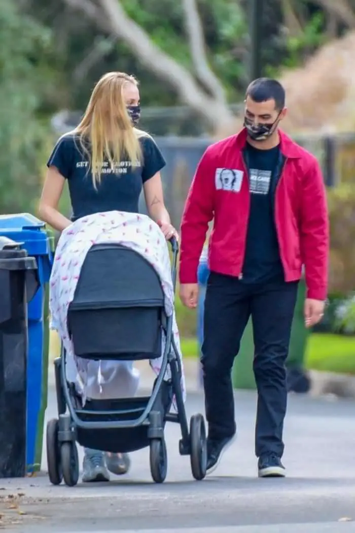 sophie turner and joe jonas walk with their baby girl around their neighborhood 3