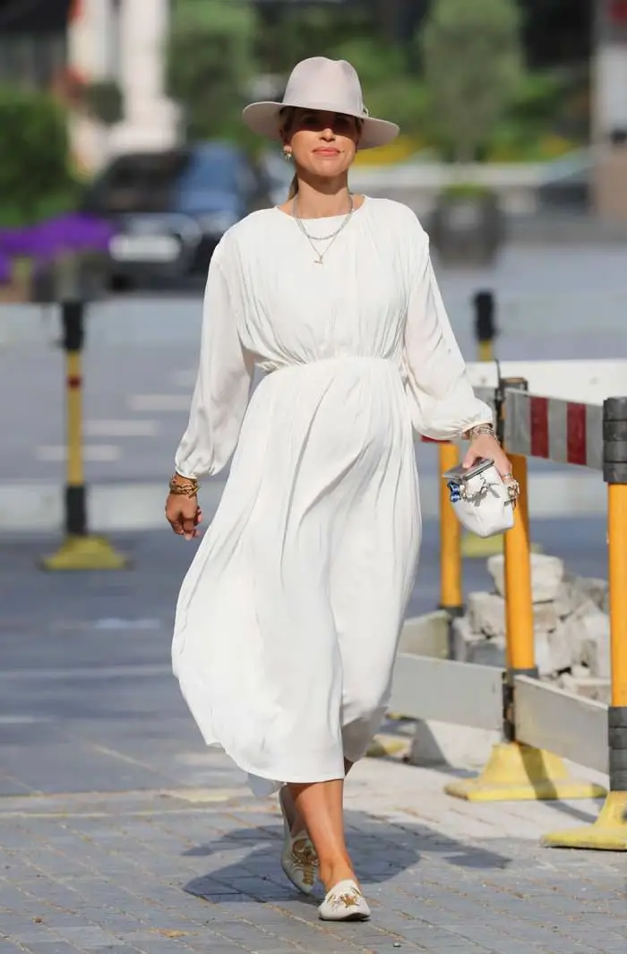 vogue williams displays her baby bump in chic white dress 3