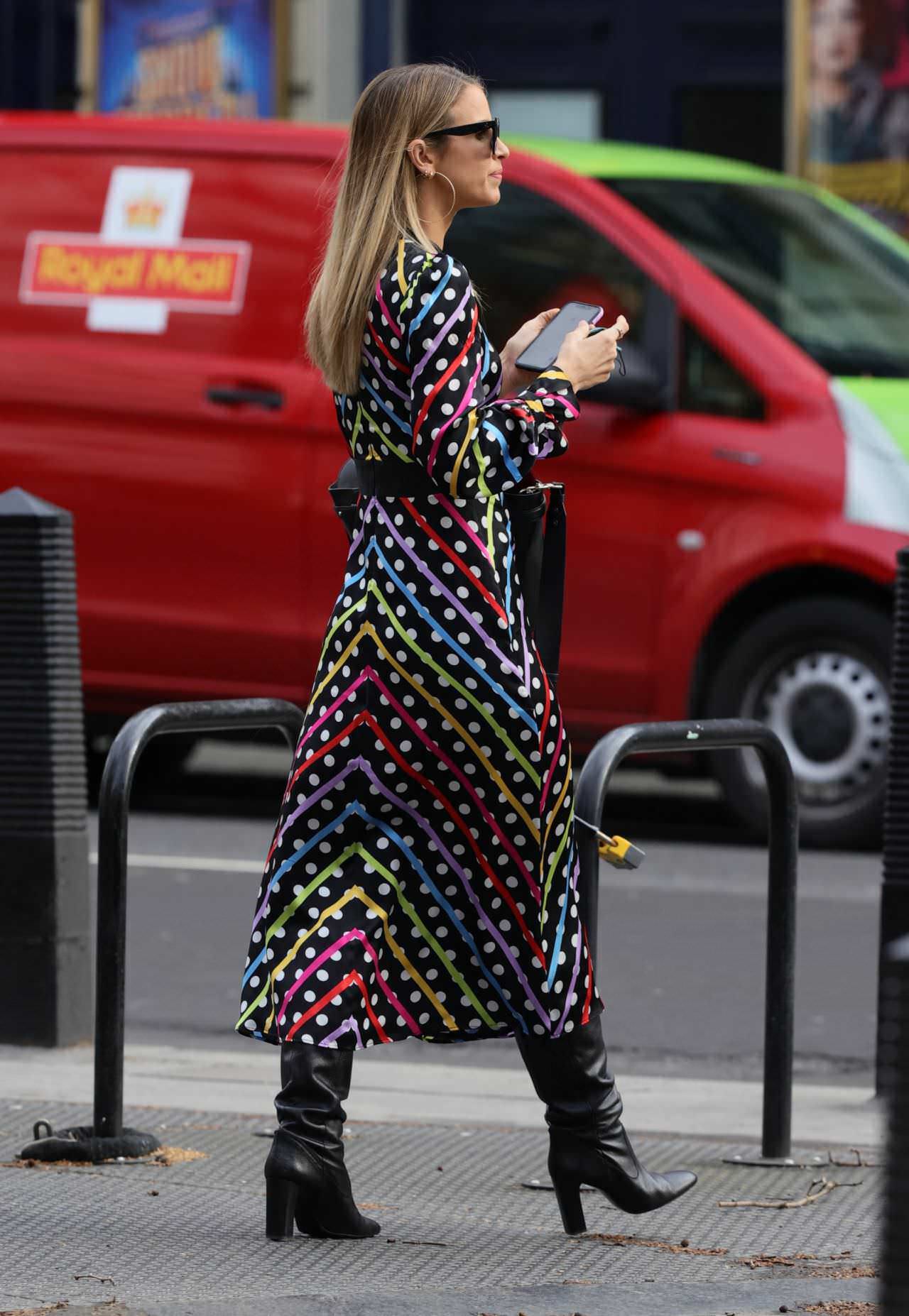 vogue williams goes to work in a chic polka dot striped dress 3